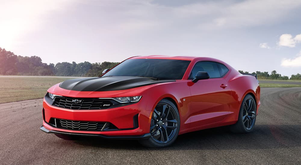 A red 2020 Chevy Camaro after leaving a dealer with used cars for sale.