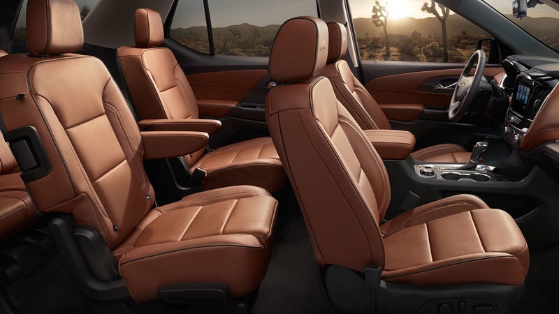 Interior view of a 2019 Chevrolet Traverse showcasing spacious seating and modern dashboard features.