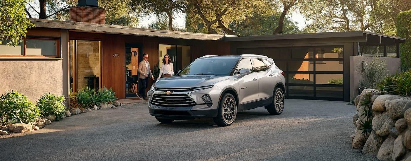 A silver 2024 Chevy Blazer is parked after viewing a Chevy SUV for sale.